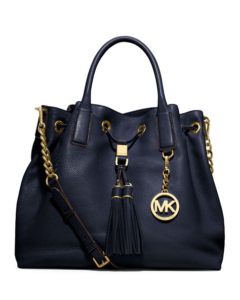 michael kors tache|Michael Kors opened satchel purse.